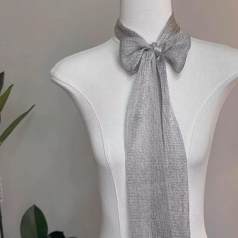 Écharpe en tissu à franges et pompons