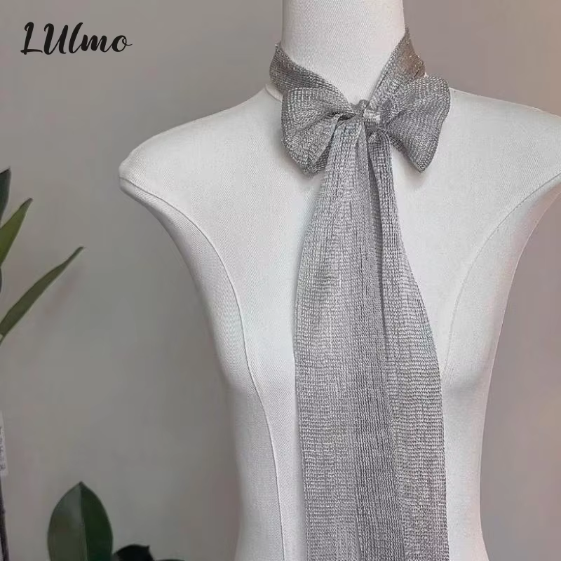 Écharpe en tissu à franges et pompons